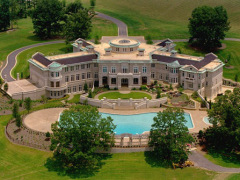 Rick Ross Buys Evander Holyfields’ Georgia Mega-Mansion